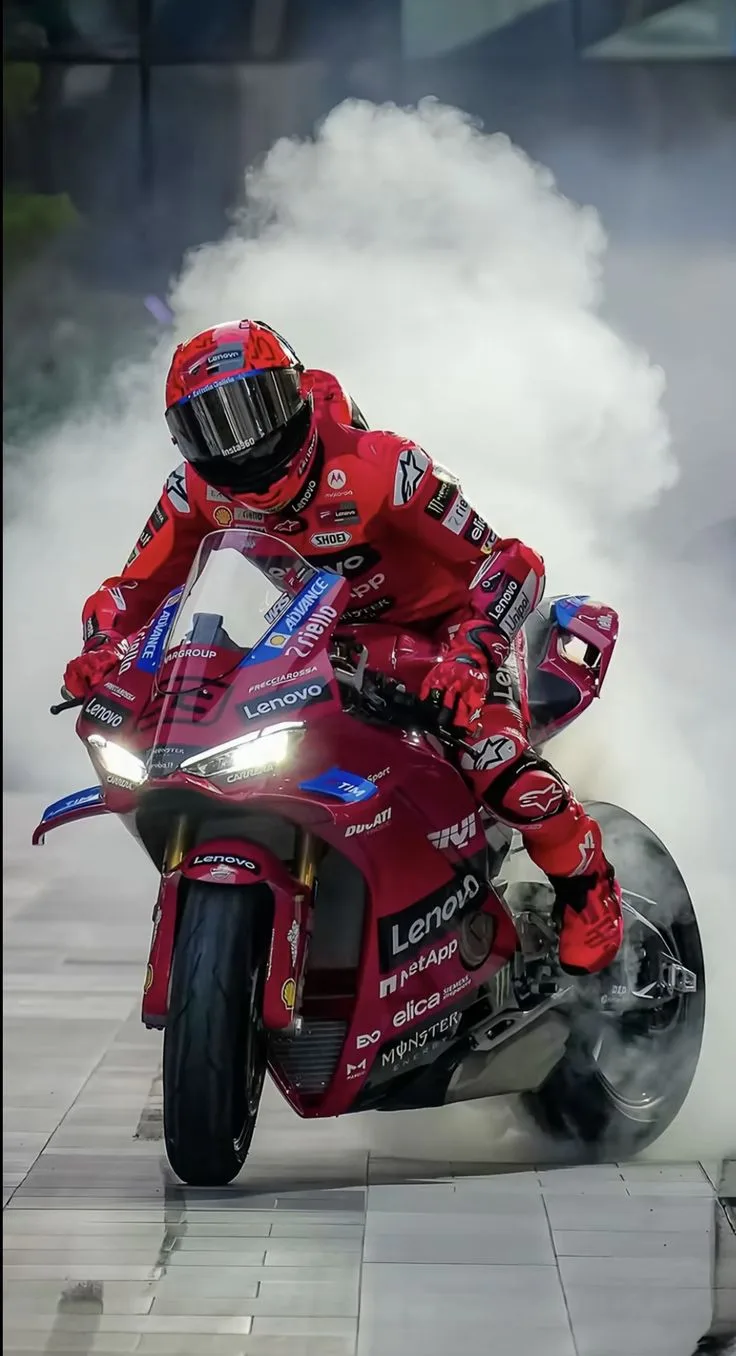 MotoGP rider with aerodynamic racing suit and helmet