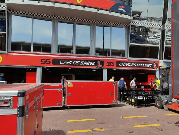 Charles Leclerc name and number 16 above Scuderia Ferrari pit box at Circuit de Monaco home race