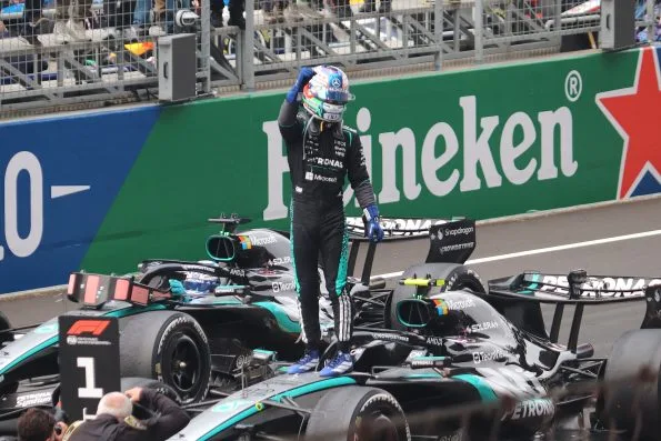 Kimi Antonelli celebrating with Mercedes team after 2026 Chinese GP