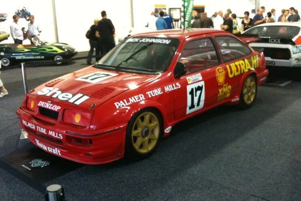 The red number 17 Shell Ford Sierra RS500 Cosworth that Dick Johnson and John Bowe drove to victory in the 1989 Tooheys 1000, on display indoors.