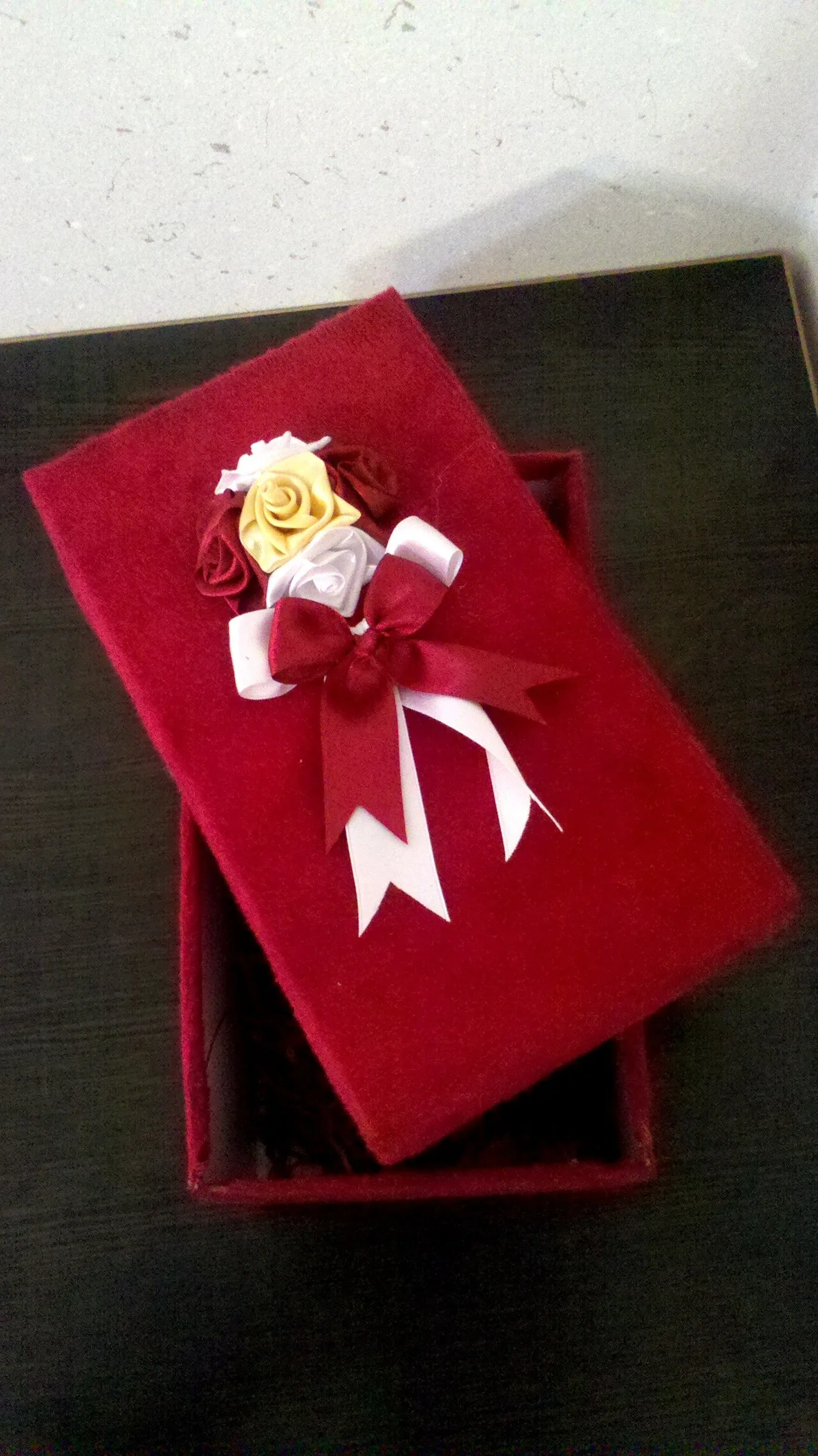 A wrapped gift box, ready to give as a present to a racing dad