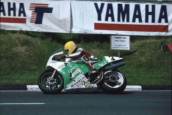 Joey Dunlop riding his Honda RC30 through Creg-ny-Baa on the Isle of Man TT Mountain Course in 1992.