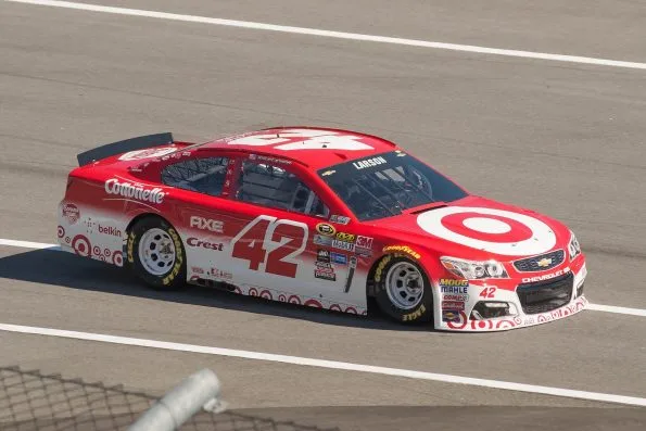 Kyle Larson driving the red No. 42 Target Chevrolet of Chip Ganassi Racing on track in 2016.
