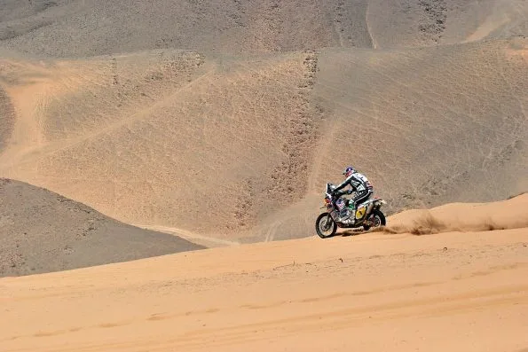 Marc Coma riding his KTM through the dunes near Copiapó during the 2010 Dakar Rally in Chile.