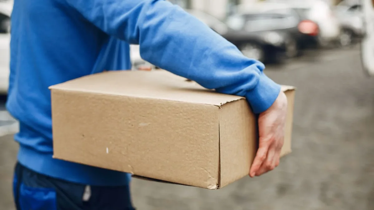 How Long Does Print-on-Demand Shipping Take? - 4 Illustrative photograph of a package being delivered